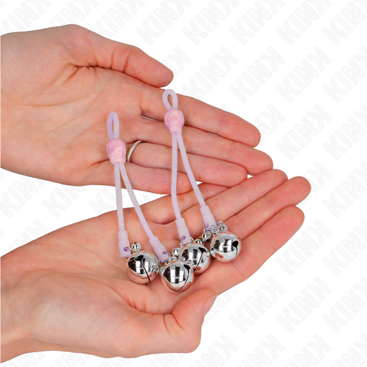 KINK - PINZAS PARA PEZONES CON CALAVERA LUMINOSA Y CAMPANILLAS AJUSTABLES ROSA/PLATA