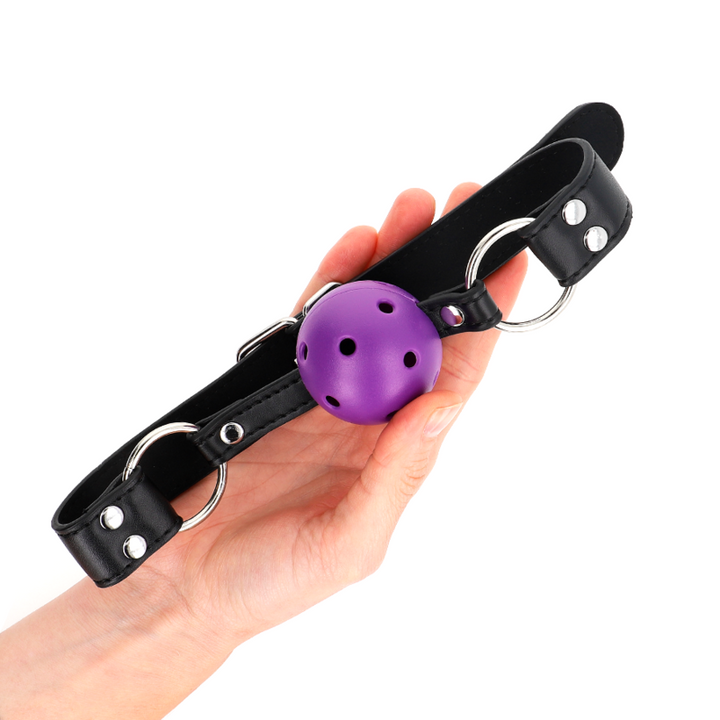 KINK - MORDAZA DE BOLA TRANSPIRABLE DE 4 CM CON DOBLE REMACHE MORADA 62,5 x 2,5 CM AJUSTABLE 42-58 CM
